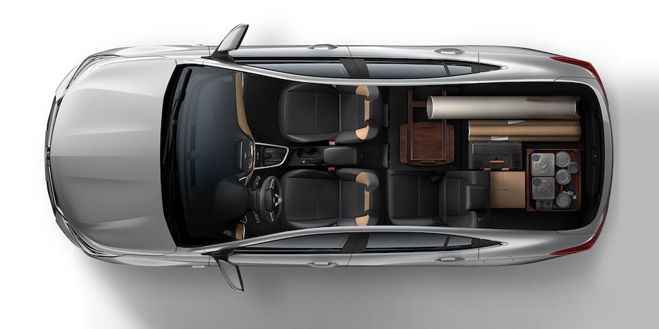 Espacio interior para llevar cosas del hogar en Chevrolet Onix 2023, sedán deportivo