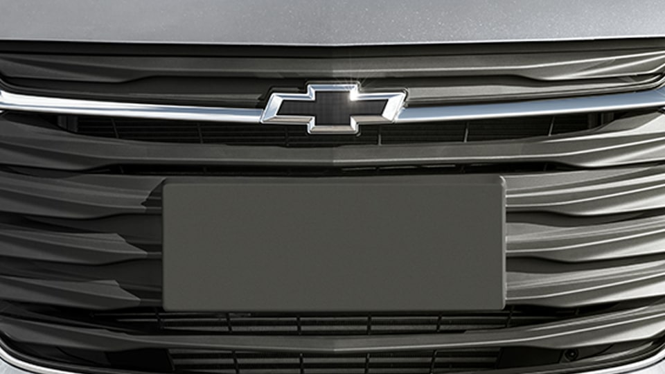 Personaliza tu sedán deportivo 2025 con el emblema frontal Onix en color negro y más accesorios externos originales Chevrolet