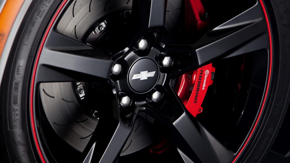 Paquete de centros de rin color negro con logo Chevrolet plateado (4 piezas)