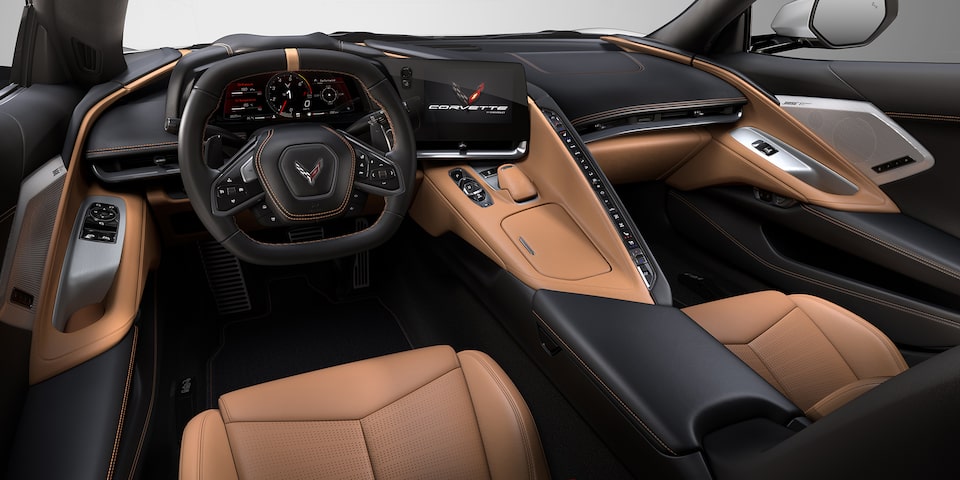 Auto deportivo de lujo Chevrolet Corvette Stingray 2025, con detalles interiores color Jet Black y Natural Bitono